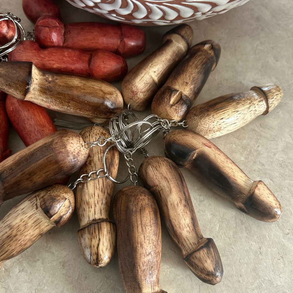 Wooden Penis Bottle openers, and small penis key chains.